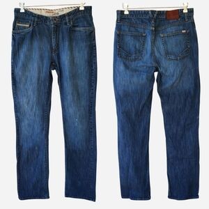 Vans "Off The Wall" Dennim Blue Jeans With A Faded Look